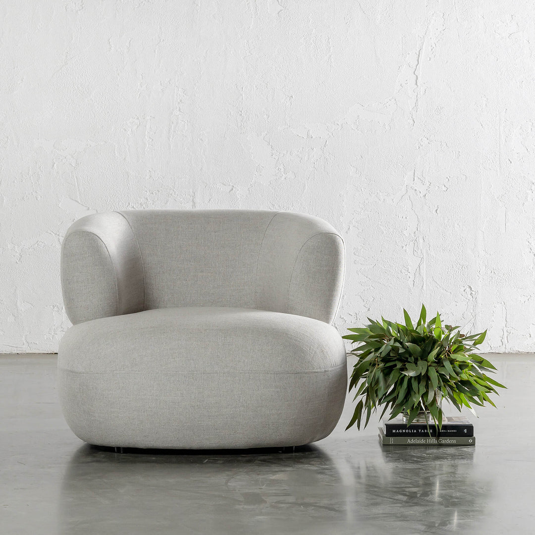 CARSON ROUNDED ARMCHAIR  |  JOVAN DOVE NATURAL