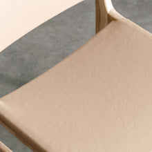 MALAND CONTEMPO SOLID LEATHER DINING CHAIR | BLONDE WOOD + TOASTED ALMOND LEATHER HIDE CLOSE UP