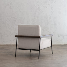 SAUVAGE ESSAN ARM CHAIR  |  SKIMMING STONE WHITE FABRIC  |  LOUNGE CHAIR REAR ANGLE VIEW