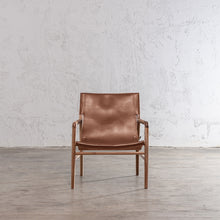 MALAND SLING LEATHER ARM CHAIR  |  TAN LEATHER FRONT VIEW