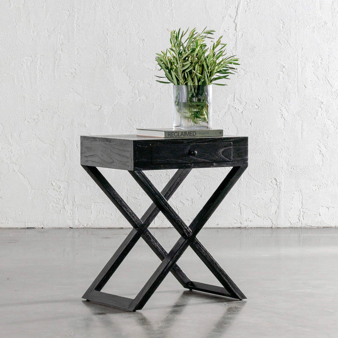 AMARA MID CENTURY CROSS LEG BEDSIDE TABLE  |  BLACK GRAIN