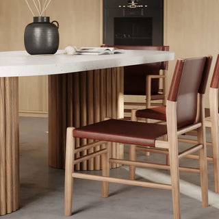 ARIA_VITOLO_PILLAR_OVAL_DINING_TABLE_TRIENT_LEATHER_DINING_CHAIR___NUTMEG_HUSK_Close_Up_2