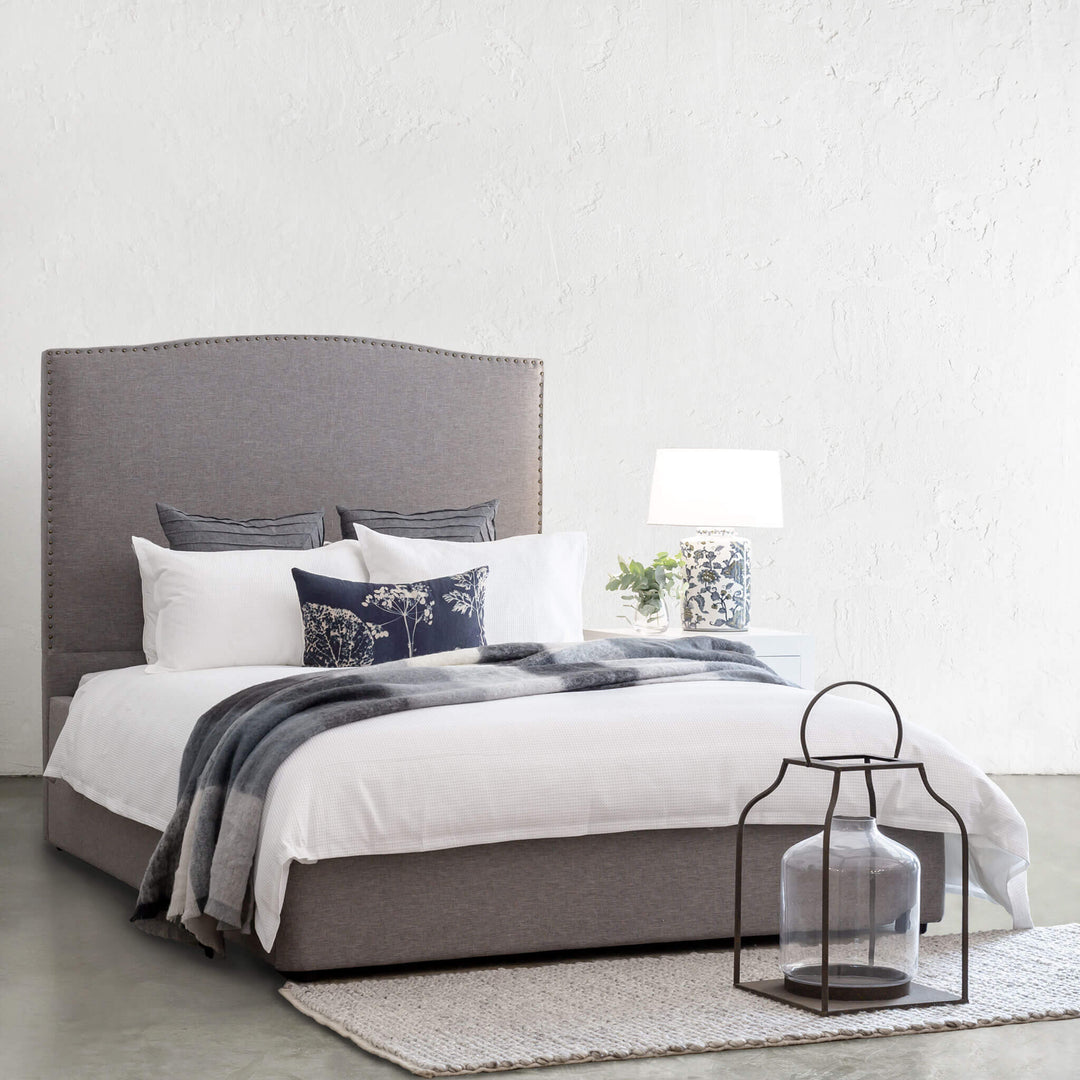 AVALON BED WITH STUDDED CURVE FRAME  |  GREY LINEN
