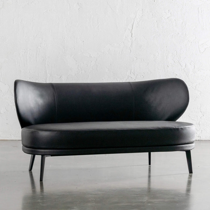 BERGEN MOLENHOEK 2 SEAT SOFA ANGLED  |  NOIR BLACK VEGAN LEATHER