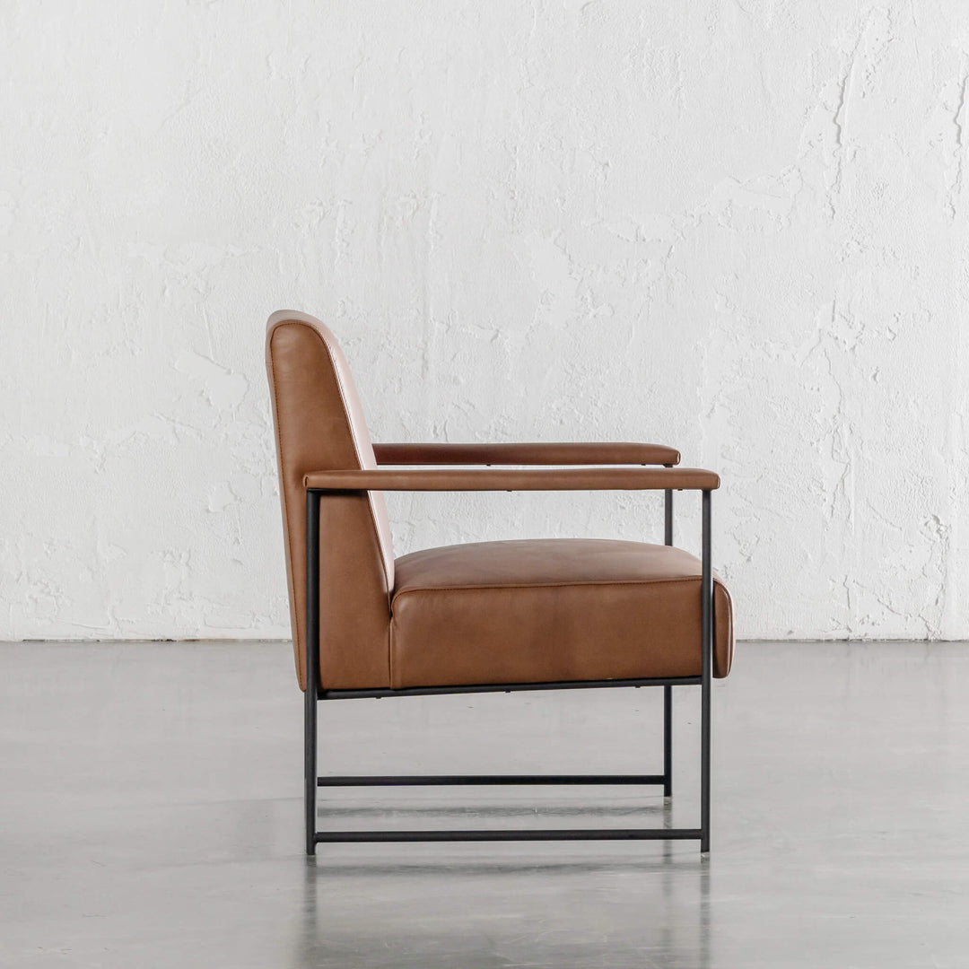 BRESSON LEATHER ARMCHAIR SIDE VIEW  |  COGNAC LEATHER