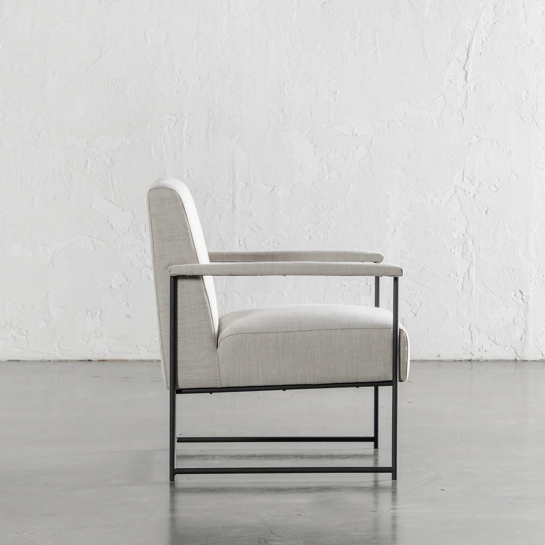 BRESSON ARMCHAIR SIDE VIEW  |  SHADED BIRCH