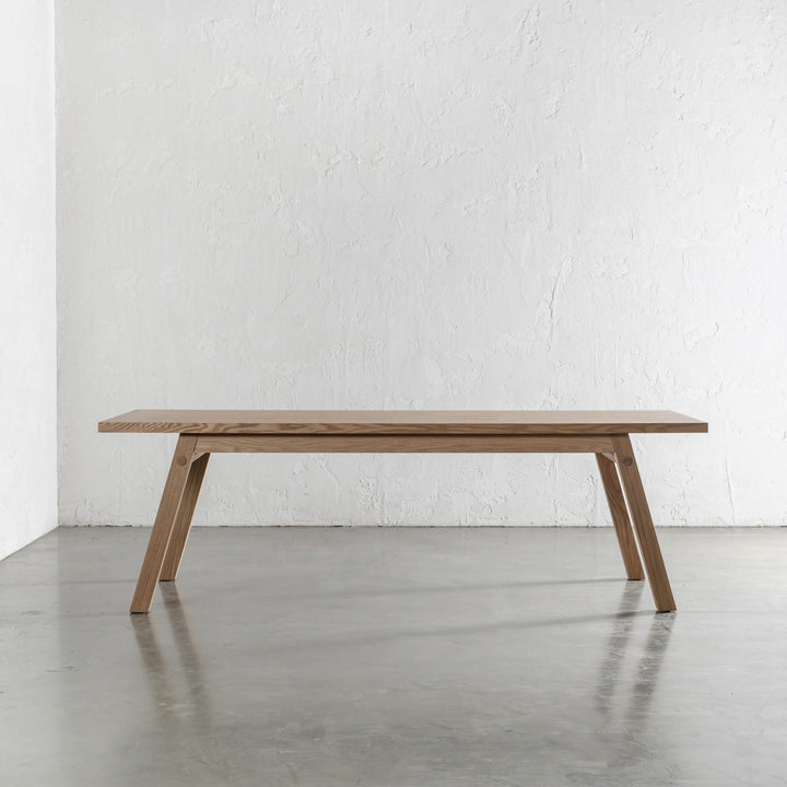 BRIONI DINING TABLE SIDE VIEW  |  BIRCH ASH WOOD GRAIN  |  240CM