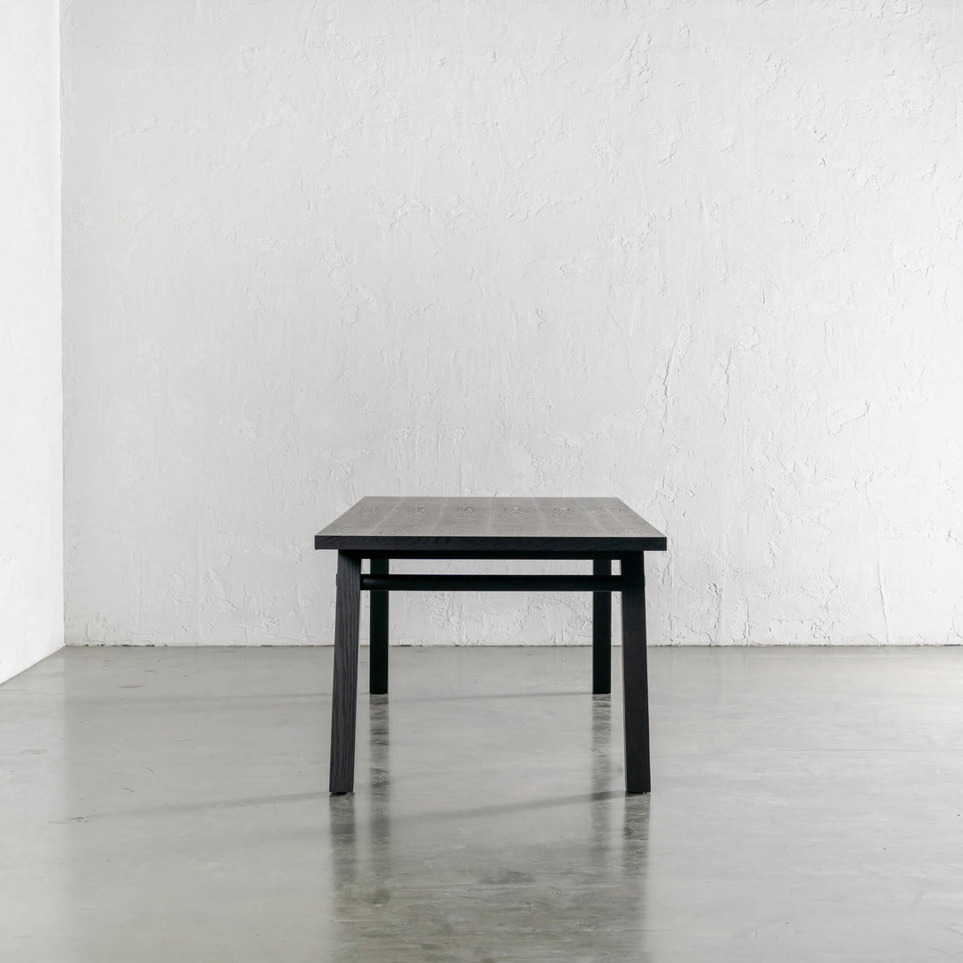 BRIONI DINING TABLE END VIEW  |  BLACK NOIR WOOD GRAIN  |  240CM