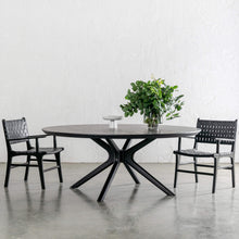 MALAND WOVEN LEATHER CARVER CHAIR  |  BLACK ON BLACK + BRETON DINING TABLE