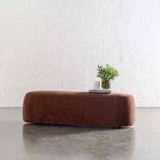 CARSON CURVED SLIM BENCH OTTOMAN | LG 160CM | TERRA RUST TEXTURED VELOUR | STYLED