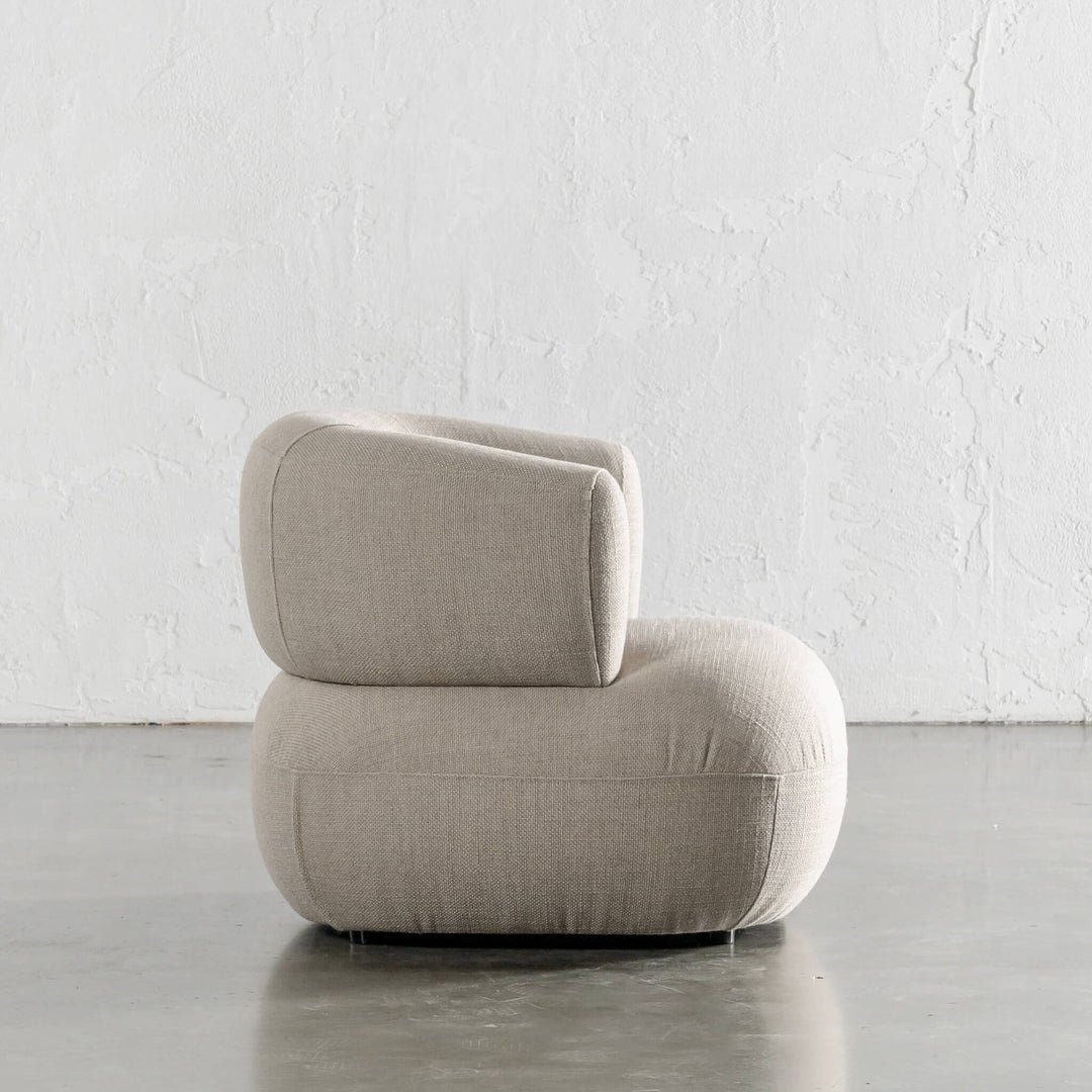 CARSON ROUNDED ARMCHAIR  |  DEEP MANUKA WEAVE SIDE VIEW