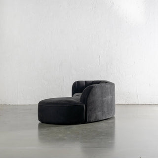 CARSON MODERNA CURVED RIBBED MODULAR SOFA SIDE VIEW  |  BLACK NOIR TEXTURED VELOUR