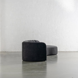 CARSON MODERNA CURVED RIBBED MODULAR SOFA SIDE VIEW  |  BLACK NOIR TEXTURED VELOUR
