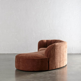 CARSON MODERNA CURVED RIBBED MODULAR SOFA SIDE VIEW  |  TERRA RUST TEXTURED VELOUR
