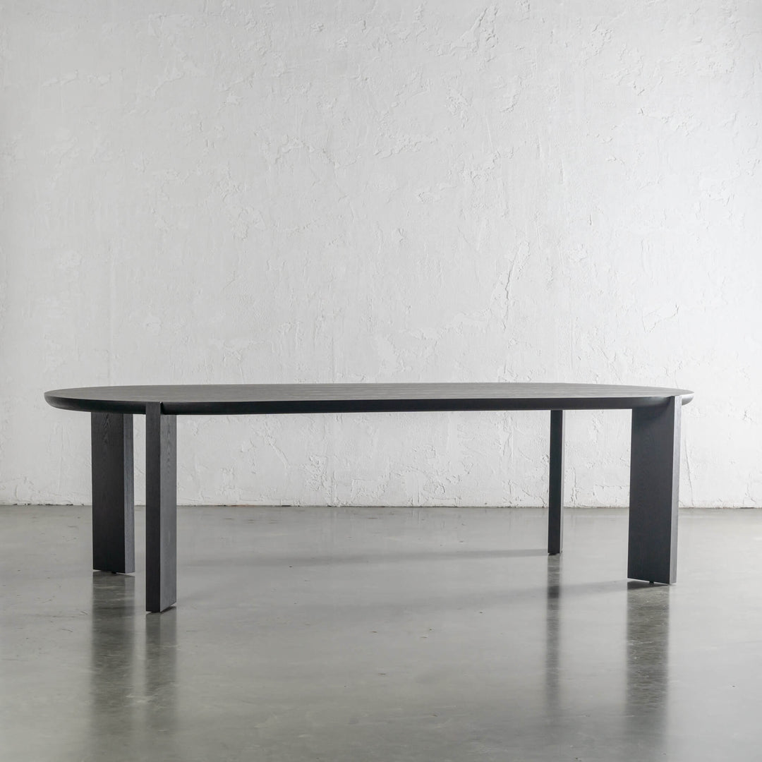 CASSAN ROUNDED DINING TABLE SIDE VIEW  |  BLACK NOIR WOOD GRAIN  |  240cm