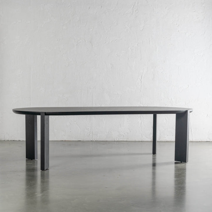 CASSAN ROUNDED DINING TABLE SIDE VIEW  |  BLACK NOIR WOOD GRAIN  |  240cm