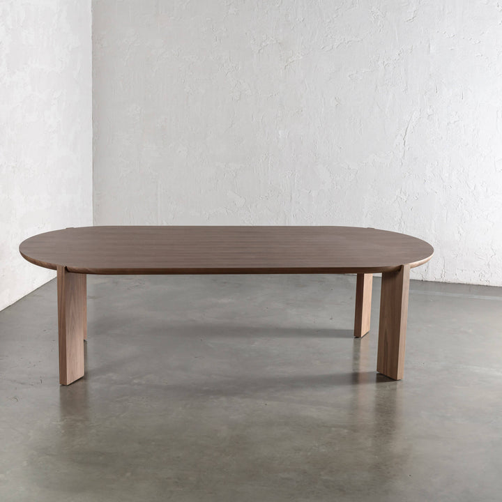 CASSAN ROUNDED DINING TABLE  |  DEEP WALNUT WOOD GRAIN