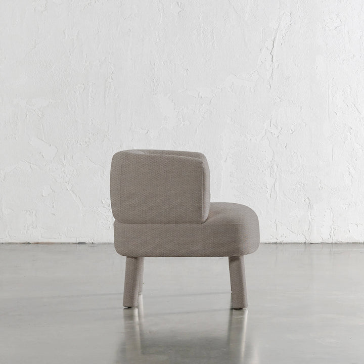 CARSON ATINA ROUNDED ARMCHAIR SIDE VIEW  |  TAUPE BASKET WEAVE