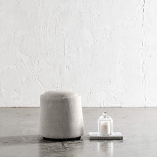 CARSON CURVE ROUND OTTOMAN | JOVAN EARTH