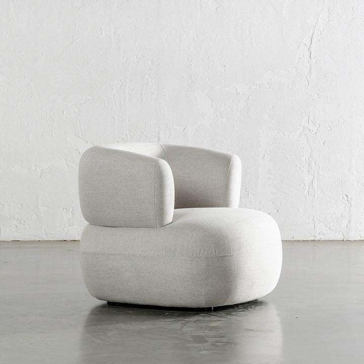 CARSON ROUNDED ARMCHAIR ANGLED  |  JOVAN DOVE