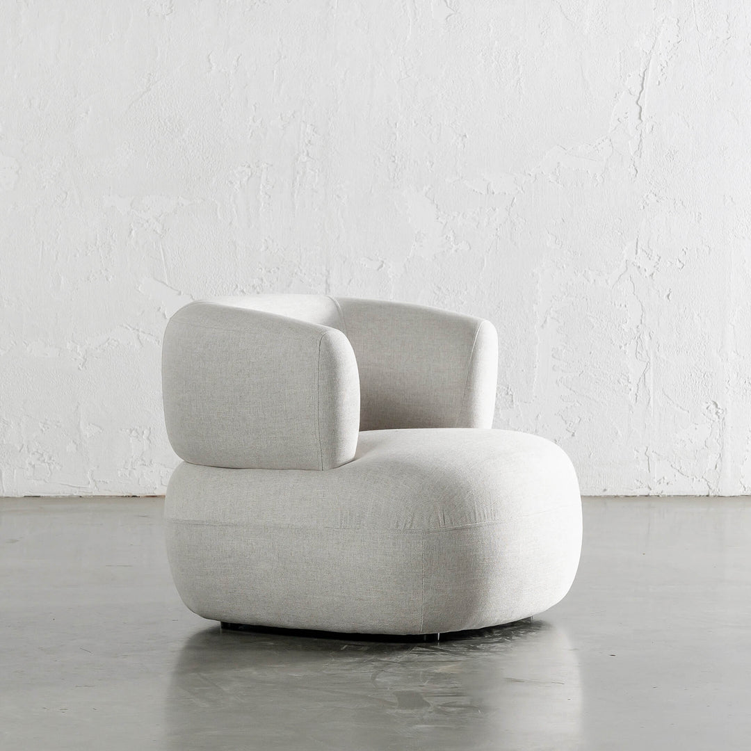 CARSON ROUNDED ARMCHAIR  |  JOVAN DOVE NATURAL