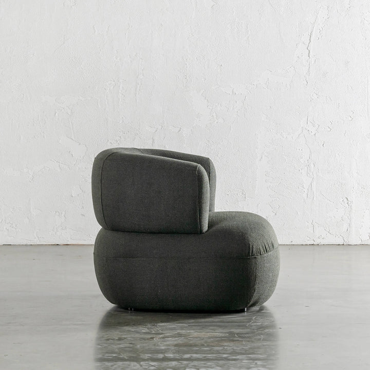 CARSON ROUNDED ARMCHAIR SIDE VIEW  |  BLADE OLIVE WEAVE