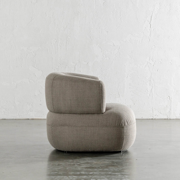 CARSON ROUNDED ARMCHAIR SIDE VIEW  |  TAUPE BASKET WEAVE