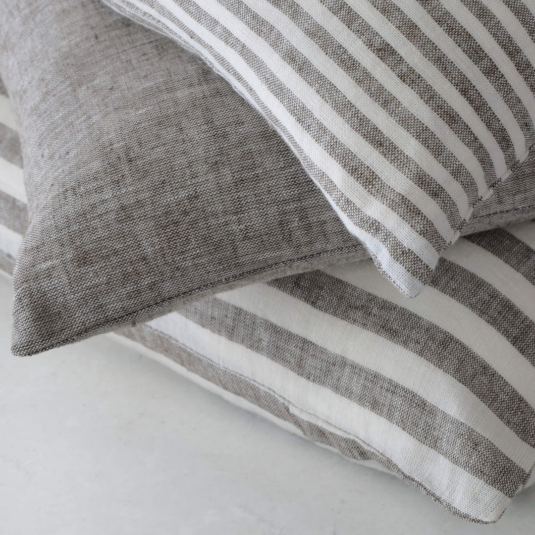 CADIZ + FRONTERA CUSHION | EBONY MOCHA | COLLECTION STACK CLOSE UP