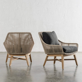 INIZIA WOVEN RATTAN INDOOR / OUTDOOR LOUNGE CHAIR ANGLED  |  BIRCH ASH