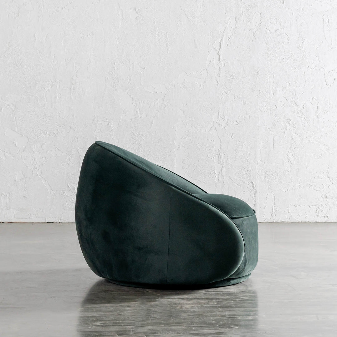 CARSON LINCOLN CURVED ARM CHAIR SIDE VIEW  |  HIGHLAND GREEN VELVET