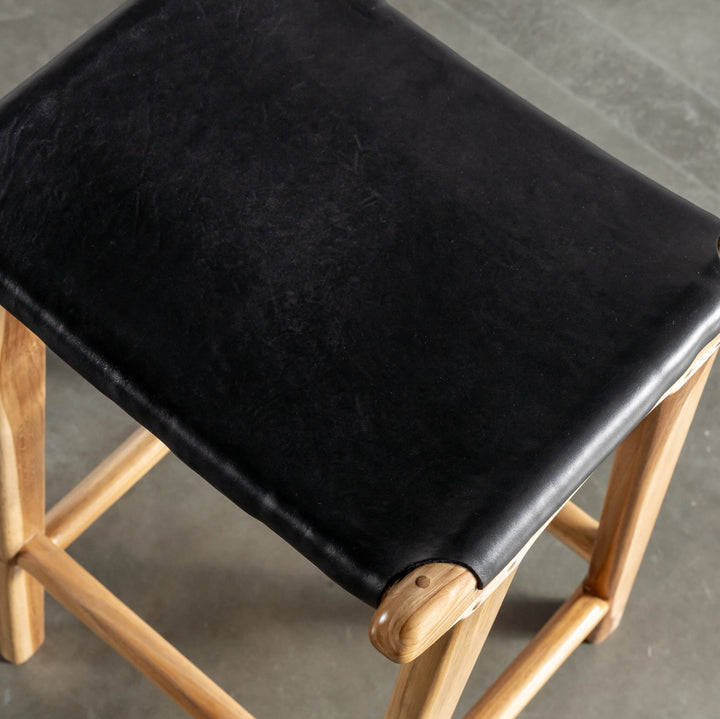 MALAND SOLID LEATHER COUNTER STOOL  |  BLACK LEATHER SOLID HIDE CLOSEUP