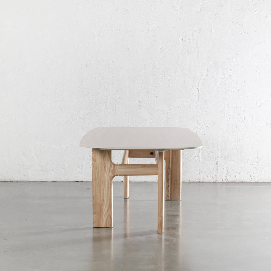 MONTAGNA DINING TABLE   |  230CM + 270CM  |  BIRCH ASH WOOD GRAIN  |  TRAVENTINE TUMBLED BEIGE