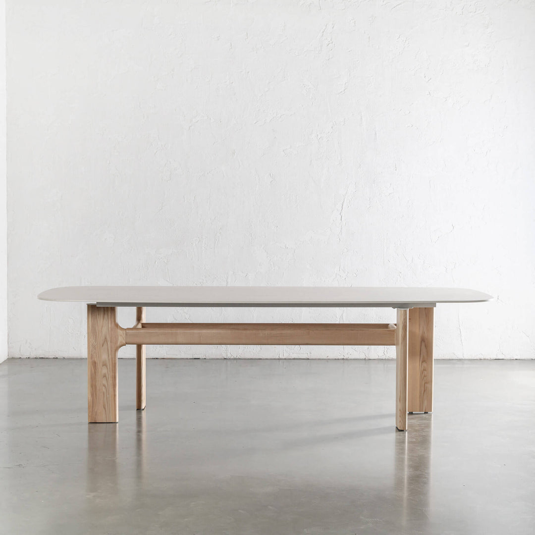 MONTAGNA DINING TABLE   |  230CM + 270CM  |  BIRCH ASH WOOD GRAIN  |  TRAVENTINE TUMBLED BEIGE