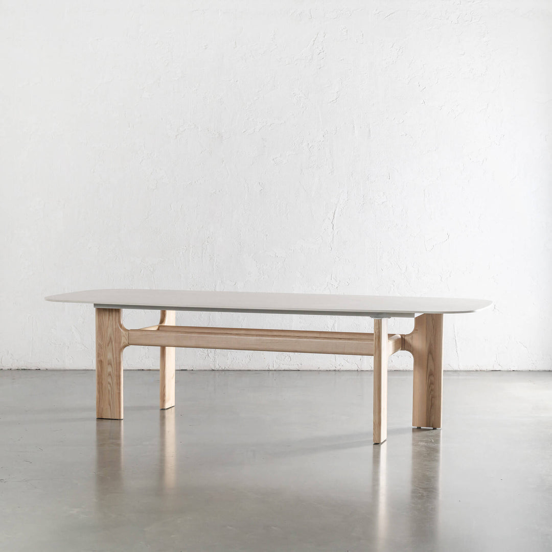 MONTAGNA DINING TABLE   |  230CM + 270CM  |  BIRCH ASH WOOD GRAIN  |  TRAVENTINE TUMBLED BEIGE