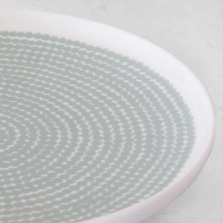 MARIMEKKO  |  OIVA SIIRTOLAPUUTAHRA PLATE 25CM | SAGE + OFF WHITE