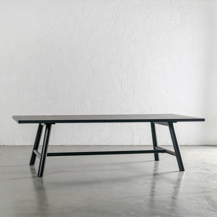 NOMA TRESTLE DINING TABLE  |  BLACK NOIR WOOD GRAIN UNSTYLED