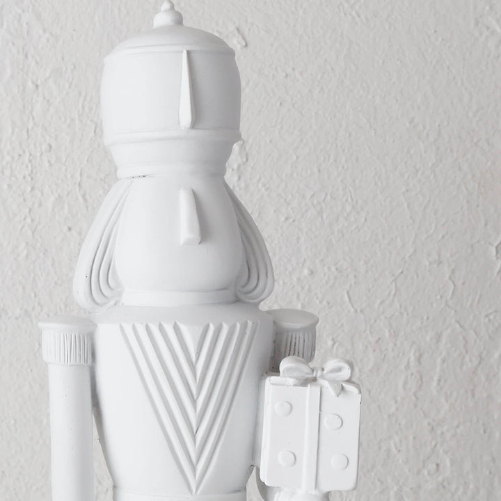 NUTCRACKER WITH PRESENT TABLE DECORATION  |  39CM  |  WHITE RESIN