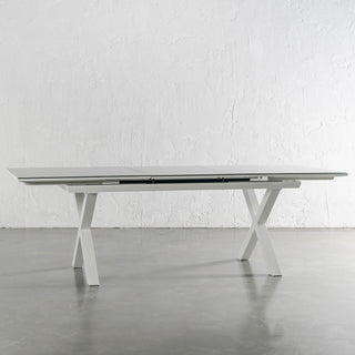 PALOMA MODERNA X LEG OUTDOOR GLASS EXTENSION DINING TABLE  |  WHITE ALUMINIUM  |  EXTENDED AT 240CM