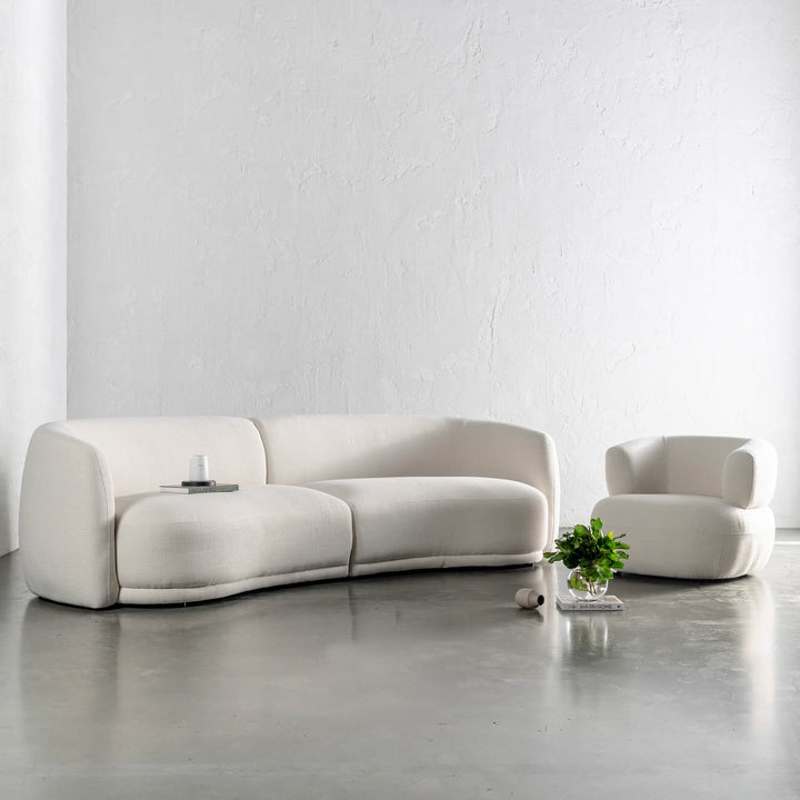 PURBECK CURVED SOFA + CARSON ROUNDED ARMCHAIR  |  SKIMMING STONE WEAVE