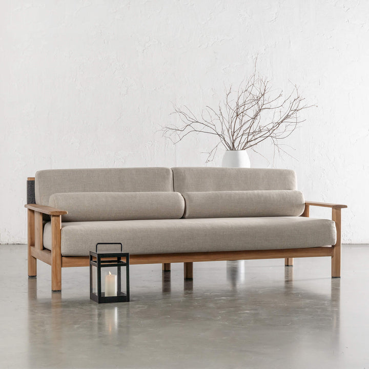 RIVA LEVANTE OUTDOOR 3 SEATER SOFA  |  PORTLAND STONE + BLACK NOIR ROPE  |  NATURAL TEAK FRAME