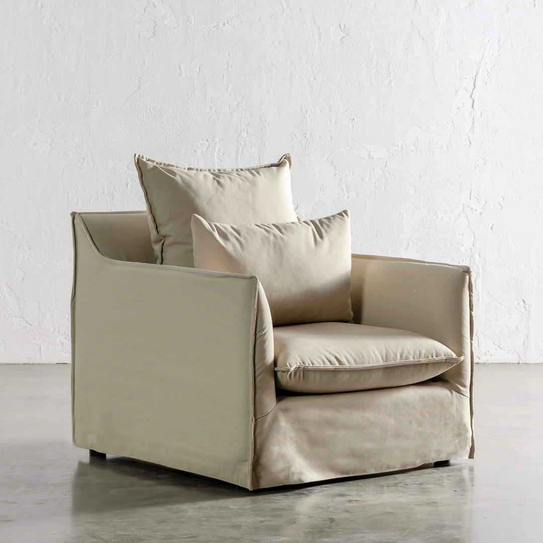 SEVILLA SLIP COVER ARM CHAIR ANGLED   |  STOWE SAND