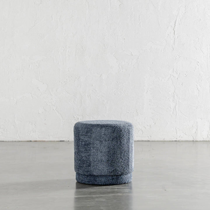 SEVILLA ORGANIC ROUND OTTOMAN  |  REEF NAVY BOUCLE