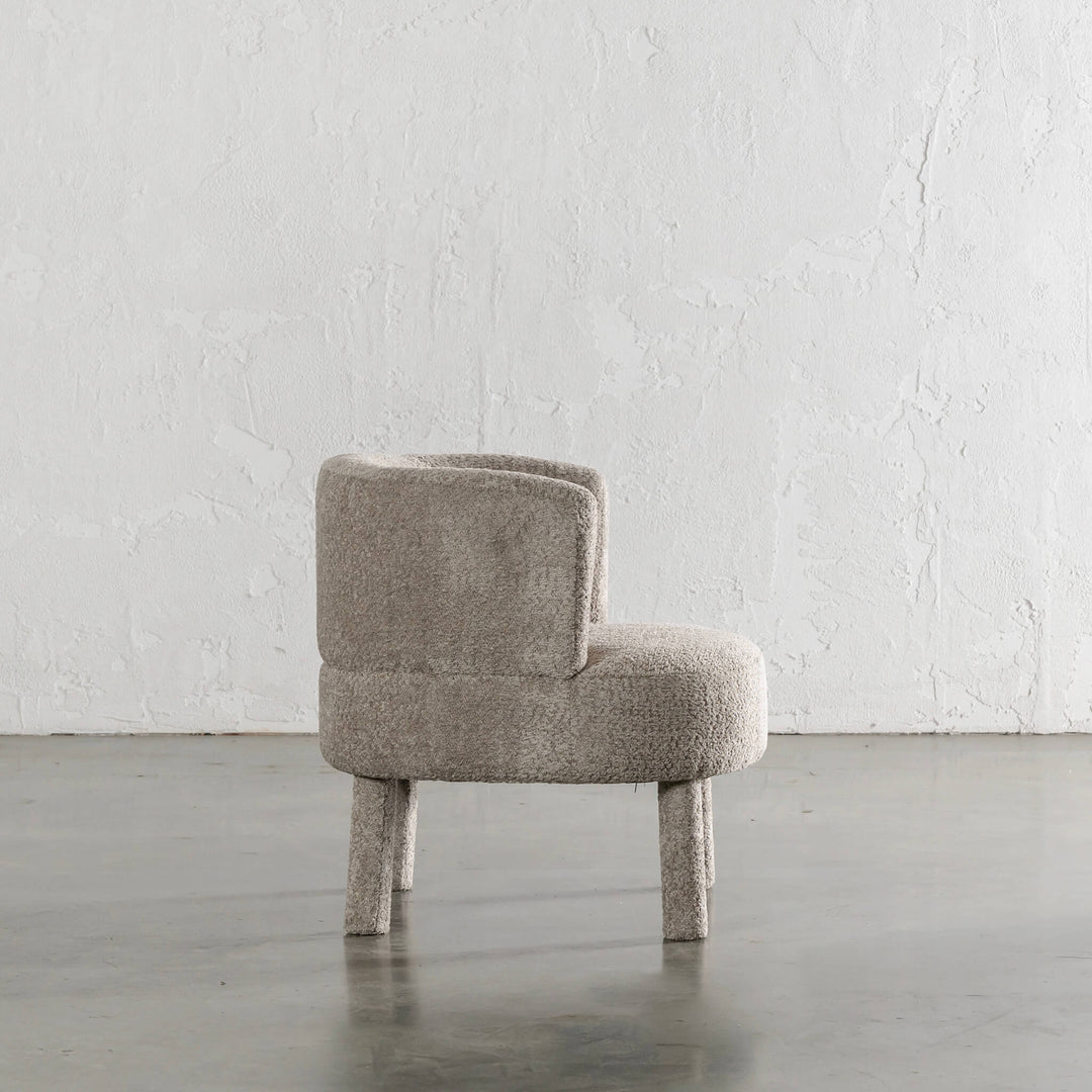 SEVILLA CURVE ARMCHAIR SIDE VIEW |  SAHARA DUNE BOUCLE