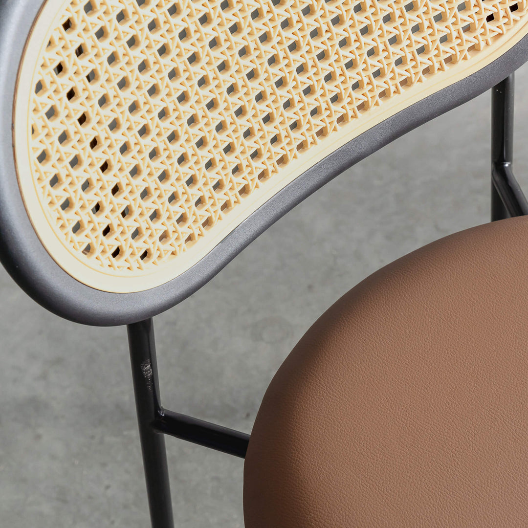 TORSBY INDOOR/OUTDOOR DINING CHAIR | NOIR BLACK + COGNAC TAN SEAT | CLOSEUP