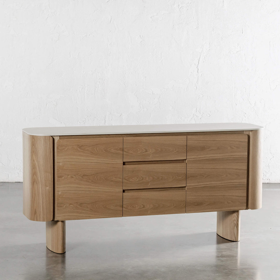 TREVELO SIDEBOARD  |  BIRCH ASH WOOD GRAIN  |  TRAVERTINE TUMBLED BEIGE CERAMICA TOP