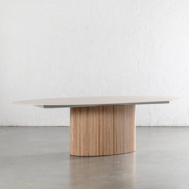 VITOLO OVAL PILLAR DINING TABLE  |  BIRCH ASH  |  TRAVERTINE TUMBLED BEIGE TOP  | 260CM