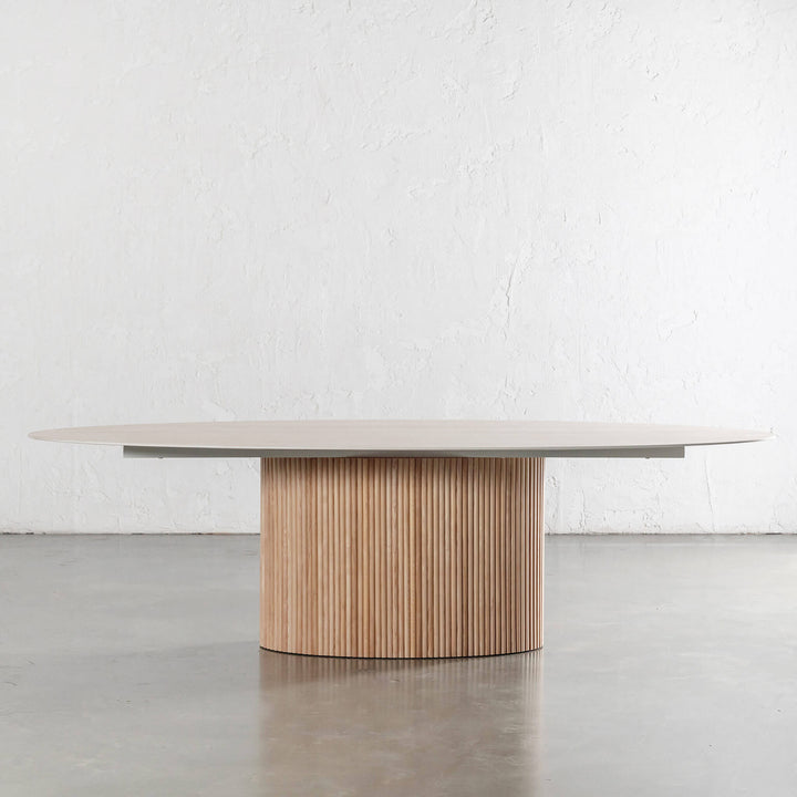 VITOLO OVAL PILLAR DINING TABLE  |  BIRCH ASH  |  TRAVERTINE TUMBLED BEIGE TOP  | 260CM