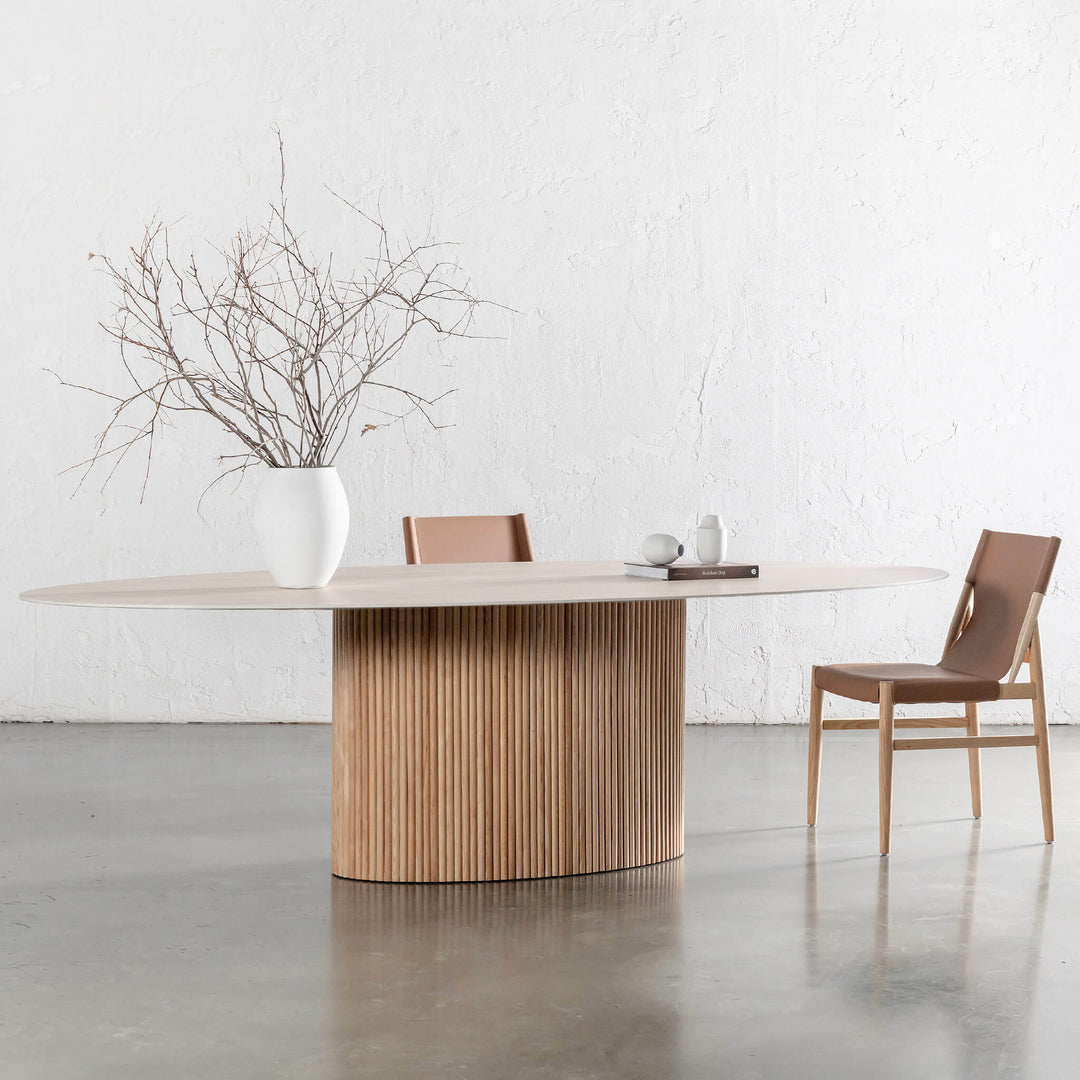 VITOLO CERAMICA OVAL PILLAR DINING TABLE  |  BIRCH ASH  |  TRAVERTINE TUMBLED BEIGE TOP  | 260CM