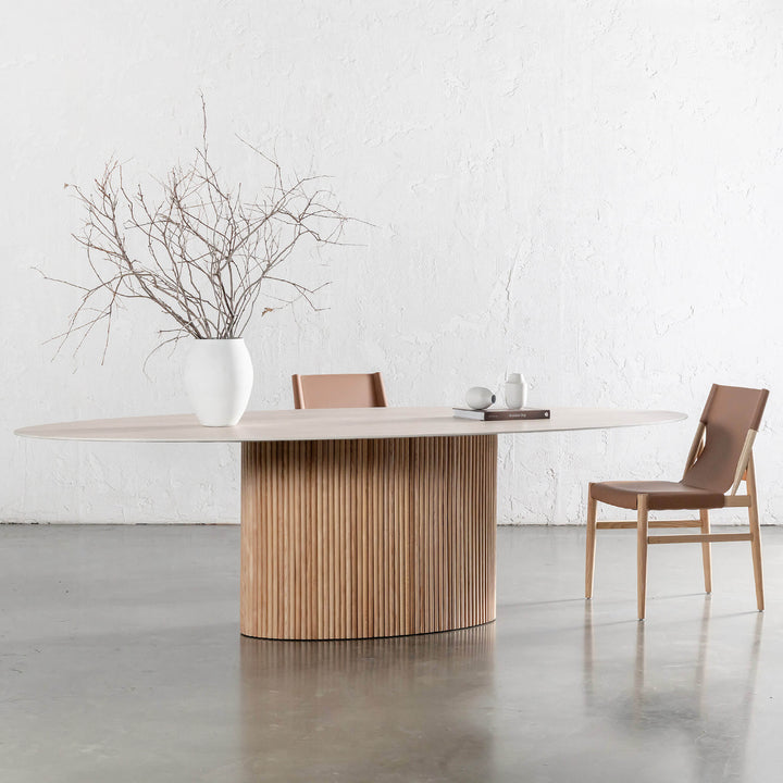 VITOLO CERAMICA OVAL PILLAR DINING TABLE  |  BIRCH ASH  |  TRAVERTINE TUMBLED BEIGE TOP  | 260CM
