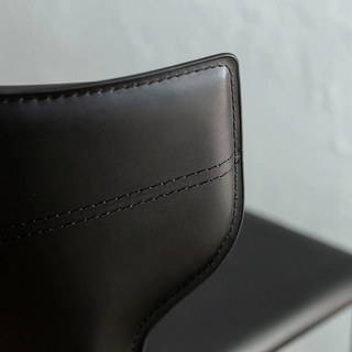 CAYDEN MID CENTURY VEGAN LEATHER DINING CHAIR CLOSE UP  |  NOIR BLACK